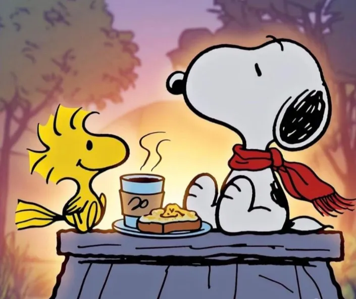 snoppy tomando cafe